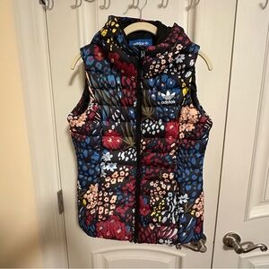 Adidas women black base with flowers pattern warm vest size S